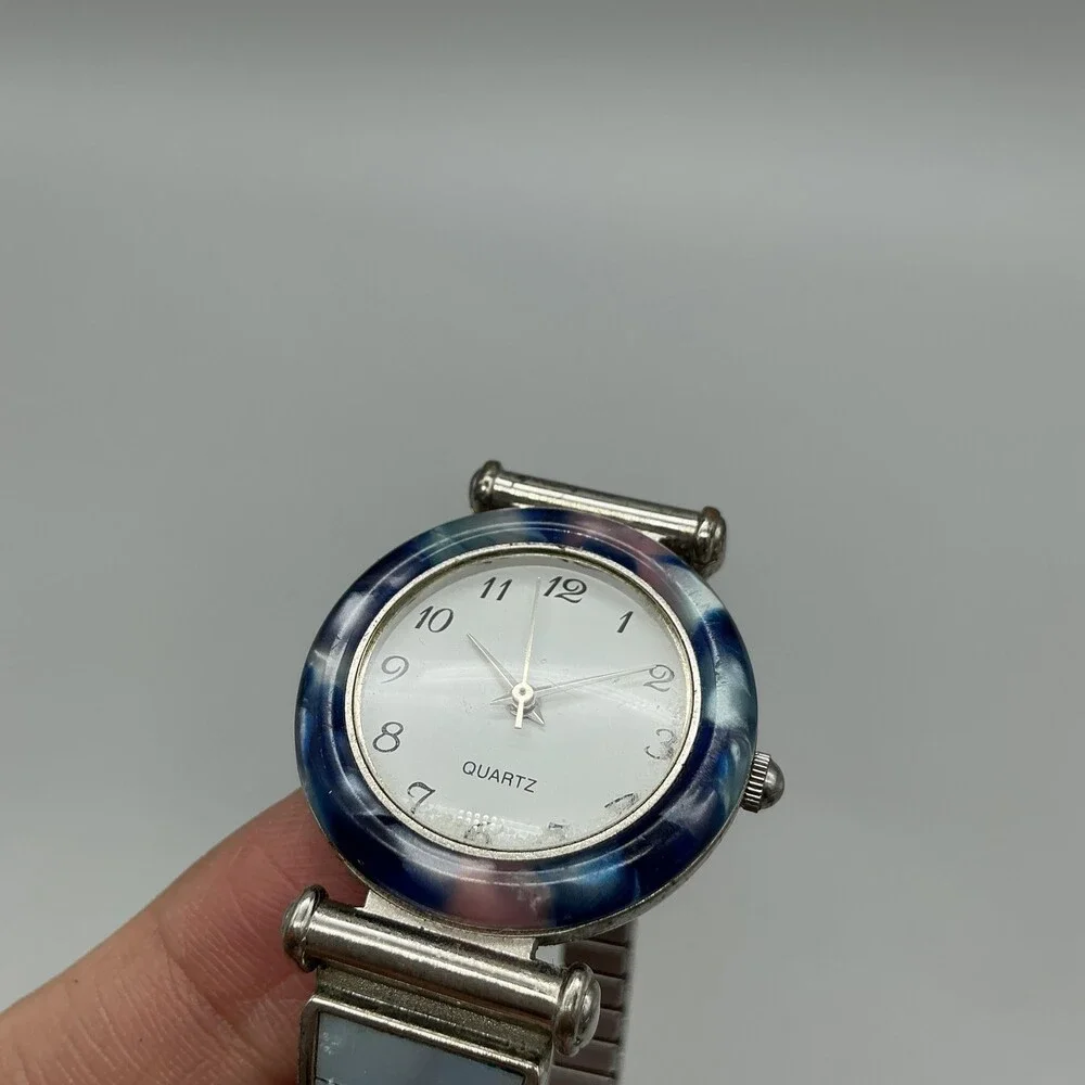 Avon F69038-1/P Women Watch 27mm Silver Tone Blue Bezel Stretch Band New Battery